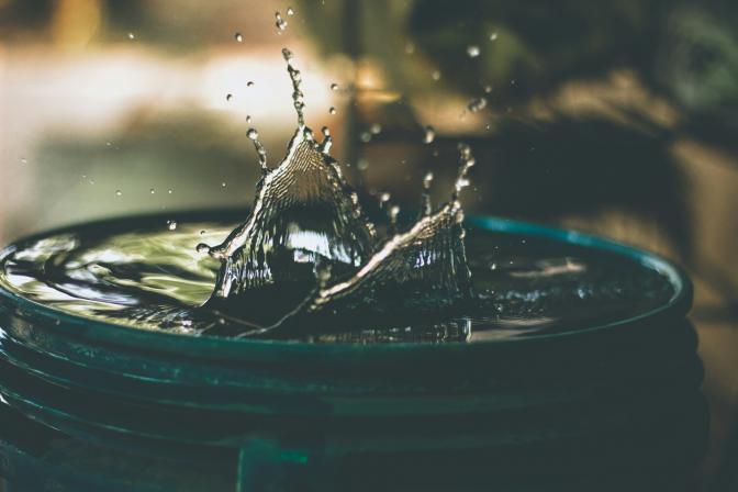 water drop splash in bucket