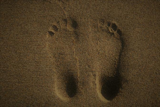 pair of footprints in the sand