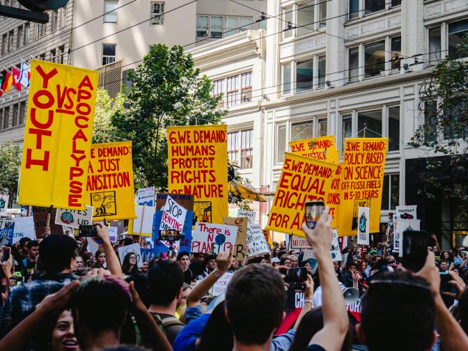 raised banners during a climate strike 