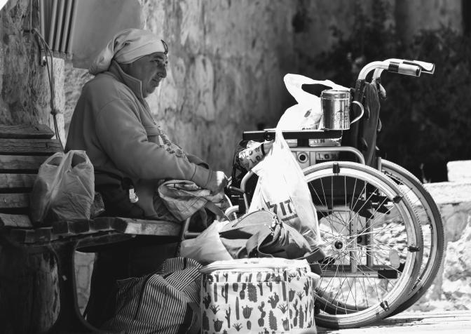 handicapped elderly women who has a wheelchair